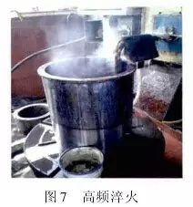 1 引言  山東魯碧建材有限公司2號輥磨為德國進口萊歇磨，主要用于生產(chǎn)礦渣微粉，減速機采用弗蘭德品牌，型號為：KMPP651，其結(jié)構(gòu)為一級傘齒加兩級行星傳動。2013年3月9日，該減速機因功率過高報警，而且潤滑系統(tǒng)回油溫度急劇升高，晚上23：25減速機潤滑站過濾器壓差高報警，整個系統(tǒng)跳停。檢查過濾器濾網(wǎng)時發(fā)現(xiàn)有大量的黃色銅屑，經(jīng)化驗銅屑成分為CuAl10Ni查閱設(shè)備圖紙推測該合金來自二級行星輪中的銅瓦。經(jīng)過咨詢，弗蘭德專家給出了同樣的判斷，并提供了具體的解決方案。隨后， 山東魯碧建材有限公司按照弗蘭德公司出具的方案對該減速機進行了搶修。目前該減速機運行接近兩個月且效果良好?，F(xiàn)將具體原因、修復方案及預防措施簡單描述。  2 原因分析  該減速機自2008年2月份開始使用，到現(xiàn)在已運轉(zhuǎn)5年多，運轉(zhuǎn)率接近90%，因此設(shè)備或多或少存在老化問題，尤其是里面的合金瓦，由于自身硬度較低，一旦潤滑不良很容易造成損傷。在拆檢減速機時發(fā)現(xiàn)二級行星有一個行星輪堆積了大量的合金，且無法轉(zhuǎn)動，證明我們的判斷正確。在對該行星輪拆檢中發(fā)現(xiàn)了以下三個問題：（1）兩側(cè)的推力瓦嚴重燒蝕熔化（圖1）；（2）銅瓦處存積了大量油泥并將潤滑油道堵塞，而且銅瓦整個開裂、軸向延展接近30mm（圖2）；（3）銷軸局部裂紋（圖3）。    根據(jù)以上損壞分析，銅瓦潤滑油孔堵塞之后，造成銅瓦急劇升溫，溫度升高到一定程度使得銅瓦受熱開裂并且膨脹延展，最終與兩側(cè)的推力瓦接觸，推力瓦受到擠壓以后迅速升溫最終燒蝕，銷軸因此承受較大的扭矩及高溫，造成裂紋。  3 處理方案  推力瓦、銅瓦、銷軸的方案為按照尺寸重新制作備件。但在檢測齒輪時發(fā)現(xiàn)其內(nèi)孔圓柱度較差以至于變成橢圓，而且表面硬度下降，遠遠低于圖紙要求（HRC55+5）。我們聯(lián)系弗蘭德公司欲購買該齒輪，對方回復該齒輪需要德國進口，加工周期為6個月，而且為保證齒輪嚙合，建議6個齒輪一起更換。此時， 山東魯碧建材有限公司銷售正處于旺季，該輥磨每天生產(chǎn)3000t微粉，停機6個月對我們的損失可想而知。我們聯(lián)系弗蘭德總部專家要求給出整改方案。對方經(jīng)過詳細計算給出如下方案：擴大齒輪內(nèi)孔直徑，再加一個過渡套，從而保證齒輪的硬度及裝配要求（圖5）。    3.1 過渡套材料選擇 過渡套材料采用42CrMo。該材料強度、淬透性高，韌性好，淬火時變形小，高溫時有高的蠕變強度和持久強度，用于制造要求強度更高和調(diào)質(zhì)截面更大的鍛件。  3.2 處理工藝    （1）鍛打：目的是減小殘留夾雜物的尺寸，使其成分趨于均勻，組織趨于致密，細化晶粒，改善鋼的性能。    （2）粗車：單邊留4mm加工余量。    （3）著色探傷：目的是檢查工件是否有損傷，從而保證下一道工序順利進行。    （4）完全退火：目的是使工件的內(nèi)部組織全部進行重結(jié)晶，通過完全退火來細化晶粒，均勻組織，消除內(nèi)應(yīng)力，同時降低硬度，便于切削加工，并為加工后零件的淬火作好組織準備（圖6）。    具體過程：零件在爐溫>800℃裝爐，立即通入甲醇：50~60ml/min、氮氣：4~6m3/h；溫度升到850℃之后甲醇：35~45ml/min、氮氣：4m3/h；保溫120min后隨爐冷降溫至650℃，停甲醇，氮氣：5m3/h；降溫至550℃時出爐空冷。    （5）半精車：單邊0.75mm，從而滿足下一步淬火的淬硬層>0.5mm的要求。    （6）高頻淬火（圖7）：該套由于工作面是套的內(nèi)孔及兩個端面，硬度要求HRC58-62，淬硬層>0.5mm。因此，選擇高頻淬火，這樣既能局部熱處理，同時也滿足硬度要求。另外，高頻淬火時工件的冷卻至關(guān)重要，為保險起見采用淬火液進行冷卻；感應(yīng)器距離工件的位置也非常重要，離得太近容易造成感應(yīng)器受熱，堵塞冷卻水溢流孔，離得太遠影響熱功率的傳遞，一般控制在3~5mm。       （7）精車外圓及內(nèi)孔：外圓最終尺寸為?330t6，內(nèi)孔最終尺寸為?330H6，這樣保證外圓與齒輪內(nèi)孔過盈配合，過盈量控制在0.2~0.3mm；內(nèi)孔與銅套間隙配合，間隙控制在0.1~0.12mm。    （8）精車端面：將過渡套與齒輪進行冷裝之后，對過渡套的端面進行精車，要求兩個端面與內(nèi)孔垂直度，圓跳度誤差控制在0.02mm以內(nèi)。 目前，該減速機已恢復生產(chǎn)兩個月，二級行星振動值3~5mm/s，輥壓9.0MPa，比表面積440m2/kg，磨機產(chǎn)量也逐漸恢復到150t/h，運轉(zhuǎn)狀況良好。  4 采取的措施  4.1 加強設(shè)備巡檢并采用先進的檢測工具 該減速機恢復生產(chǎn)之后，我們加強了巡檢力度，購買了先進的在線巡檢儀，它不僅能對減速機振動進行檢測形成趨勢圖，而且還能進行數(shù)據(jù)傳輸及保存，這樣我們就能夠通過趨勢圖來推斷減速機運行狀況。  4.2 加強油品檢測 目前，我們每個月都要對潤滑油進行檢測，項目有粘度、機械雜質(zhì)、水分、污染等級等，通過對油樣的檢測，可以隨時掌握減速機內(nèi)部運轉(zhuǎn)狀況，保證了潤滑的可靠性。  4.3 提高磨機操作水平 喂料粒度控制在80mm以內(nèi)，這樣既能保證碾磨料層厚度避免磨機振動，又能提高研磨效率；另外，加強選粉機轉(zhuǎn)速、喂料量、熱風控制的調(diào)整，從而保證磨機穩(wěn)定順行。  4.4 選用材質(zhì)較好的濾芯 弗蘭德KMPP651減速機內(nèi)部全部為滑動軸承，對潤滑油的潔凈度要求比較高，一旦有異物進入很容易造成油道堵塞。因此，濾芯的選用至關(guān)重要，我們現(xiàn)在選用的是力士樂25μm濾芯，使用效果很好。  5 結(jié)語  輥磨的穩(wěn)定運行對減速機的使用壽命至關(guān)重要，減少輥磨運行的振動值，有利于減速機提高使用壽命；另外，定期檢測減速機各個軸瓦部位的振動，并且定期對潤滑油進行檢測及檢查過濾網(wǎng)上有無雜質(zhì)，對提高減速機的穩(wěn)定順行也至關(guān)重要。